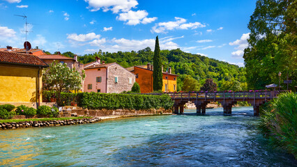 Borghetto Valeggio sul Mincio, Verona, Italy. Italian traditional village with vintage colorful...