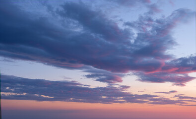 Naklejka na ściany i meble Beautiful dramatic scenic after sunset sky background after sunset