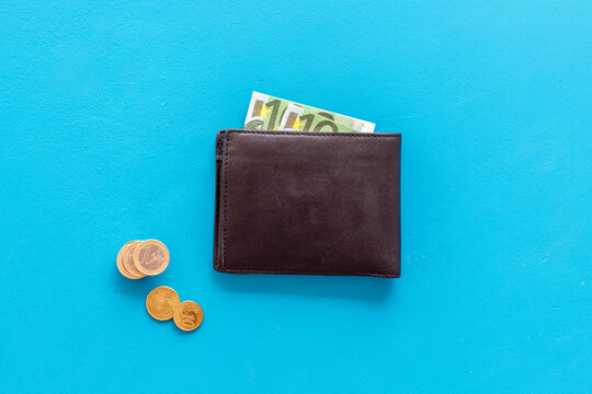 Black male wallet with Euro banknotes. Counting money, economy concept
