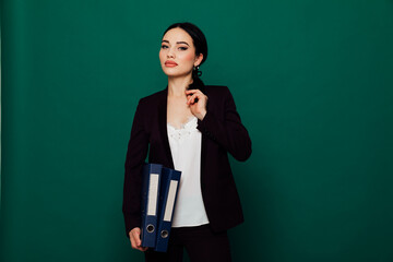 Business beautiful woman in brown business suit in office