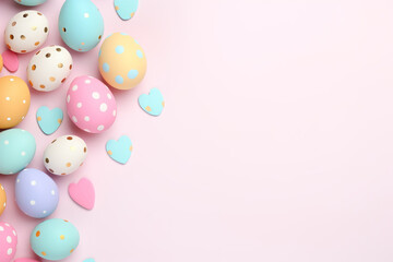 Fototapeta na wymiar Colorful easter eggs on pink background. 