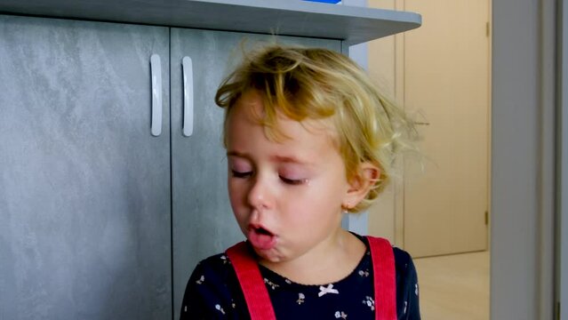 The child has snot. Selective focus.