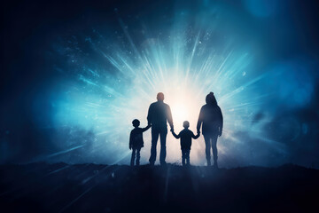 Fototapeta na wymiar Silhouette of family walking towards a bright light.