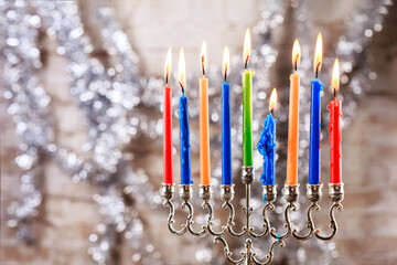 Hanukkah menorah igniting holy holiday with jewish hanukkiah candlelight