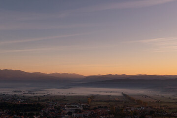 aerial view of foggy morning autumn mountains with clouds bansko bulgaria