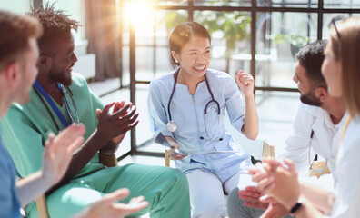 Group of multi national doctors for discussing analysis in the conference room