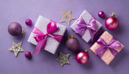 christmas day concept top view photo of lilac gift boxes with ribbon bows pink and purple baubles on violet background with copyspace