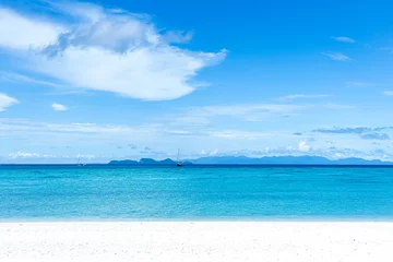 Fototapeten Beautiful sea, Tropical Turquoise clear blue sea and white sand beach with long tail boats  at Lipe Island  Satun Thailand  © Anusara