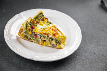 quiche vegetable open pie savory baked goods puff pastry, corn, green peas, beans, green beans, bell pepper healthy eating cooking appetizer meal food snack on the table copy space food background