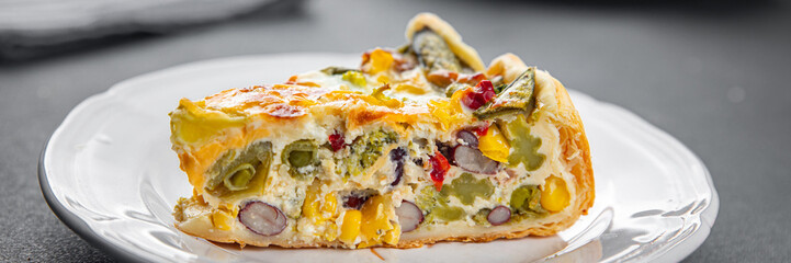 quiche vegetable open pie savory baked goods puff pastry, corn, green peas, beans, green beans, bell pepper healthy eating cooking appetizer meal food snack on the table copy space food background