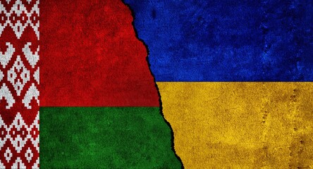 Ukraine and Belarus painted flags on a wall. Ukraine and Belarus relations. Belarus and Ukraine flags together