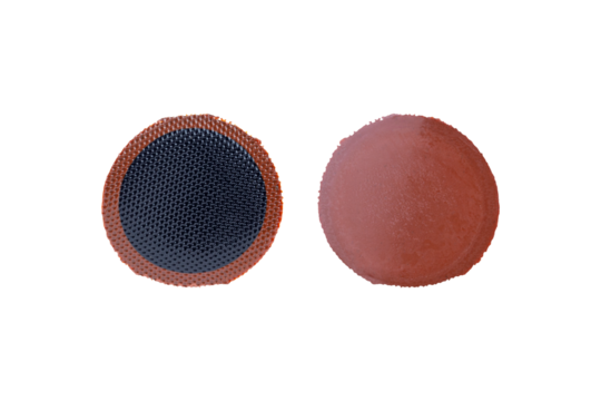 round plasters for tire repair,  plasters for repairing tire punctures isolated from background