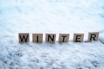 heavy snowfall, wooden letters on snow, seasonal changes, winter weather conditions and snowfall,...