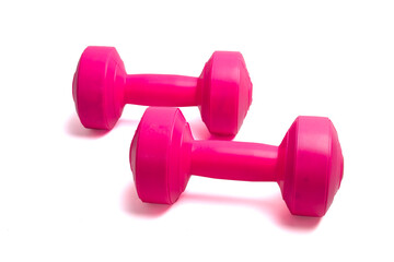 Two pink dumbbells isolated on white background