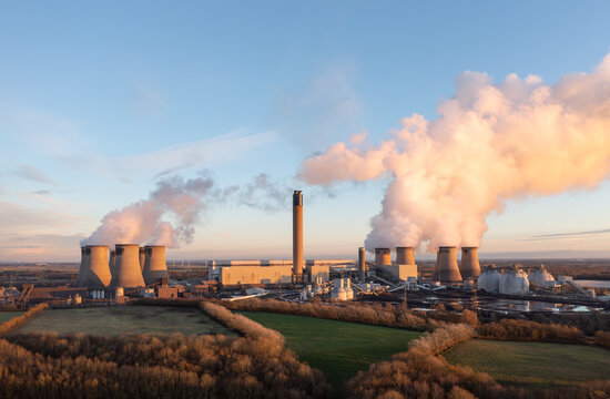 coal fired power station in UK with coal stack and biofuel storage tanks for clean energy production