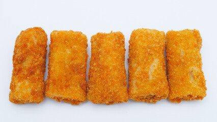 Spicy chicken risoles stuffed with chicken and chili and enclosed in crape-like wrappers and rolled into bread crumbs and fried. isolated on white background.