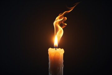 A lit candle with smoke coming out of it.