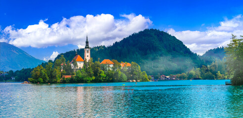 One of the most beautiful lakes of Europe - lake Bled in Slovenia. panoramic view with island and...