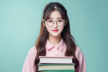 Cute Asian Girl with Glasses Ready for Back to School on Pastel Background