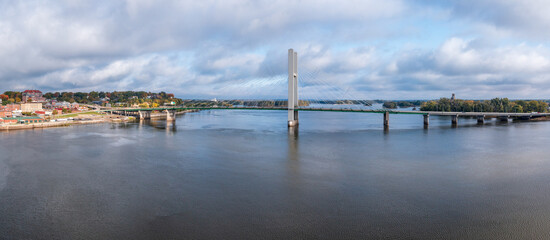 Aerial panorama of the unusual single tower cable stay Great River Bridge across Mississippi...
