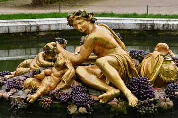Fototapeta na wymiar Versailles; France - october 27 2023 : statue in the castle park