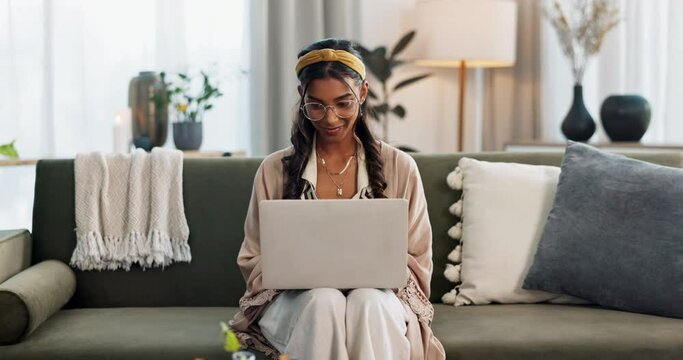 Remote work from home, connection and woman with a laptop, typing and digital app in a living room. Person, freelancer and entrepreneur on a couch, pc and copywriting with editor, writer and internet