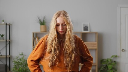 Exhausted beautiful female have sad nothing to do with absent minded sit cozy home living room