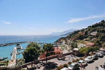 Ventimiglia, Italy -  July 30, 2023 : View of the seaside promenade in the town of Ventimiglia, Italy