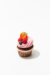 cupcake creamy chocolate strawberry on the white background 