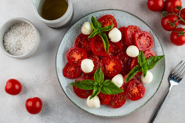 Caprese salad with tomato, basil and mozzarella. Italian salad. Italian food.