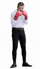 man in full growth. isolated on a white background in business clothes with boxing gloves