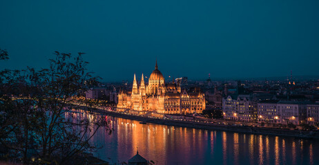 Budapest, Hungary. Night view on Parliament building over delta of Danube river.
