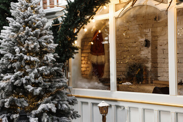 Beautiful Christmas tree and festive decor indoors. Interior design