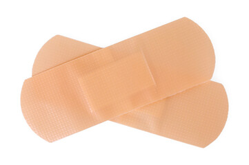 Medical adhesive bandages isolated on white, top view