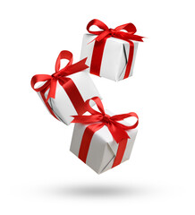 Christmas gift boxes flying on white background