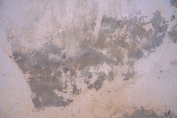 Water damaged ceiling roof in an old house. Water damage building interior. Ceiling house broken. Ceiling concrete crack and exposed the rusty steel bar frame