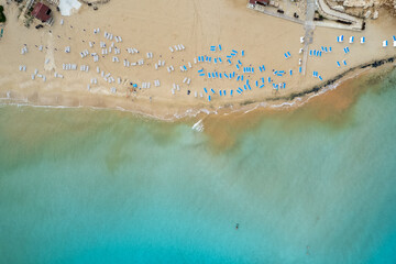 Drone aerial of beach sandy tropical beach. Summer holidays vacations in the sea. Fig tree bay...