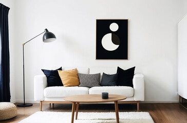 Modern living room with abstract art on a white wall, and cool pillows on a white loveseat