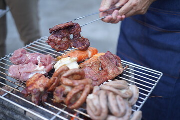 Asian, American and African family parties with grilled seafood and beer drinks, BBQ