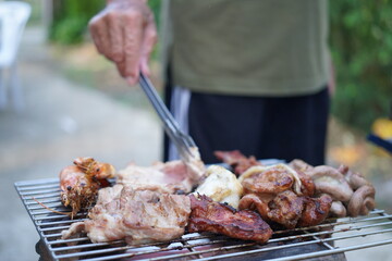 Asian, American and African family parties with grilled seafood and beer drinks, BBQ