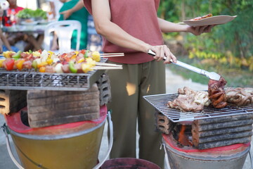 Asian, American and African family parties with grilled seafood and beer drinks, BBQ
