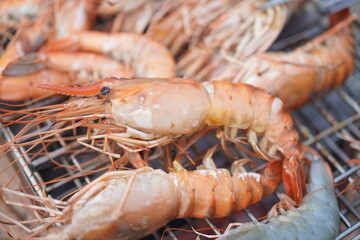 Asian, American and African family parties with grilled seafood and beer drinks, BBQ