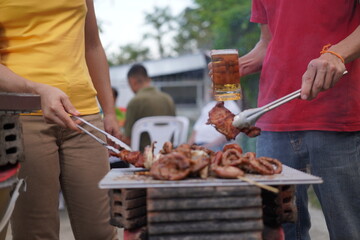 Asian, American and African family parties with grilled seafood and beer drinks, BBQ