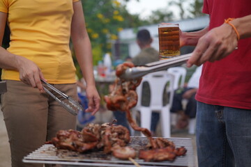 Asian, American and African family parties with grilled seafood and beer drinks, BBQ
