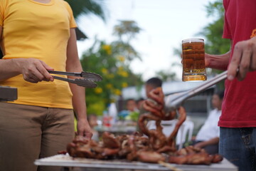 Asian, American and African family parties with grilled seafood and beer drinks, BBQ