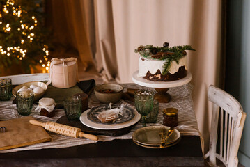 Christmas table set with cake and decor