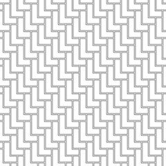 L shape blocks wallpaper. Repeated white mosaic figures on black background. Seamless surface pattern design with polygons. Pavement motif. Digital paper with pavers for page fills, web designing.