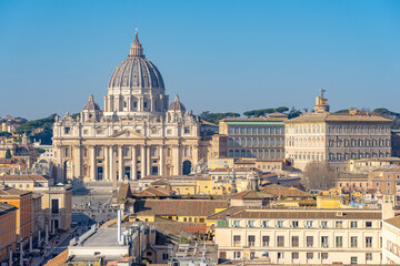 Fototapeta na wymiar dome of basilica of st. peter in vatican seen across the castel of sant angelo in rome, italy