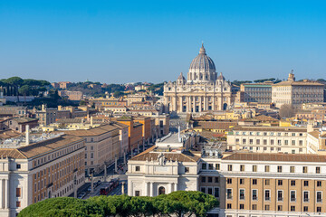 Fototapeta na wymiar dome of basilica of st. peter in vatican seen across the castel of sant angelo in rome, italy