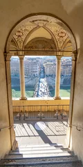 Fototapete view of the bridge and the river Tiber through an arched balcony belonging to the castle of sant angelo in rome © Pedro Emanuel 